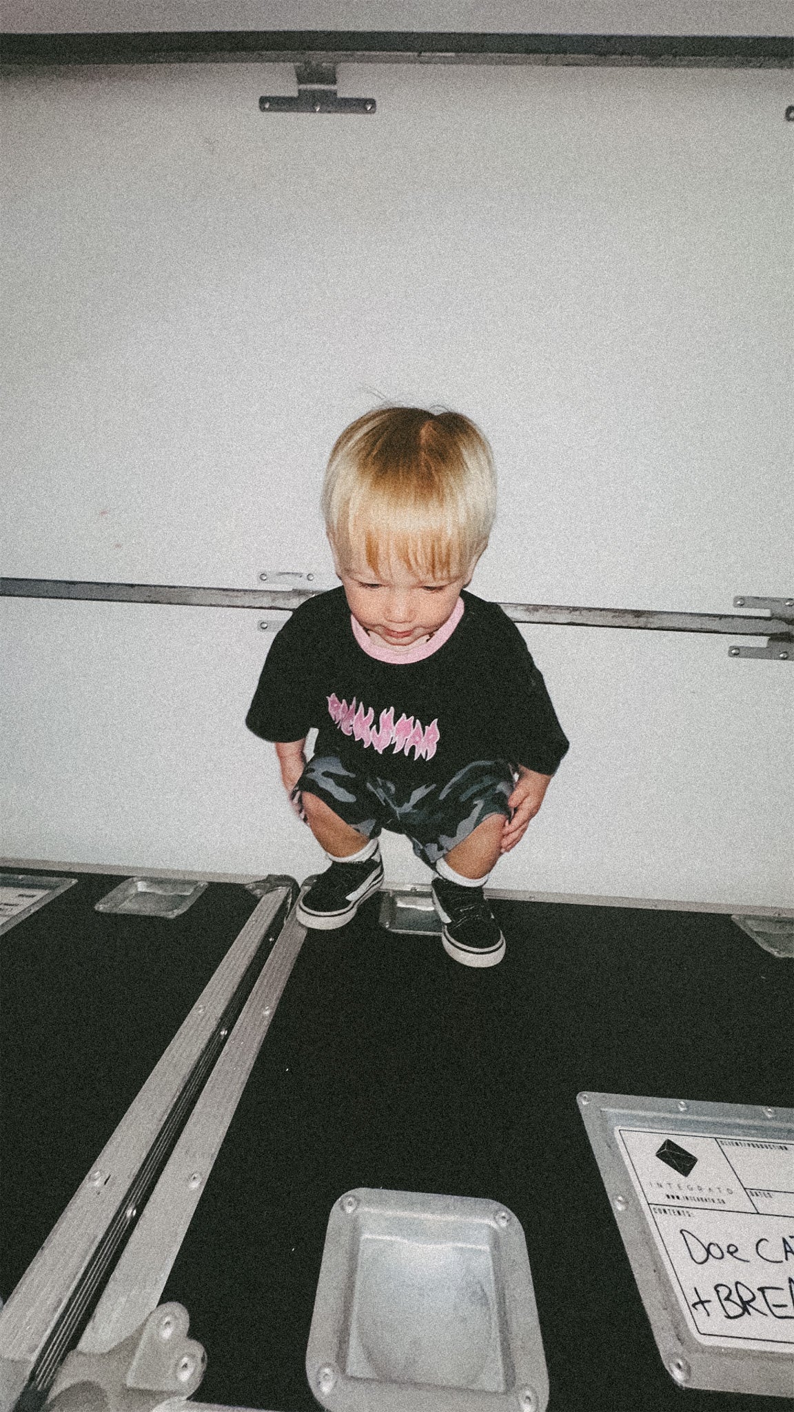 rockstar kid with camo shorts