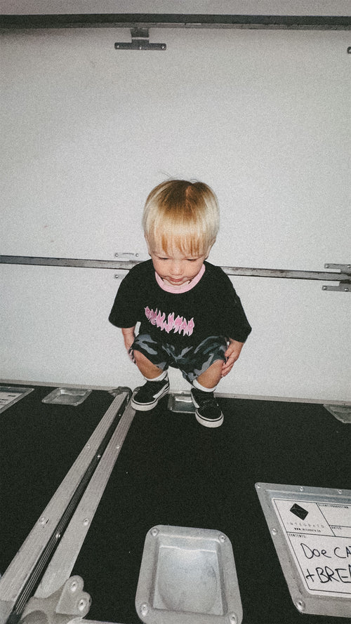 rockstar kid with camo shorts
